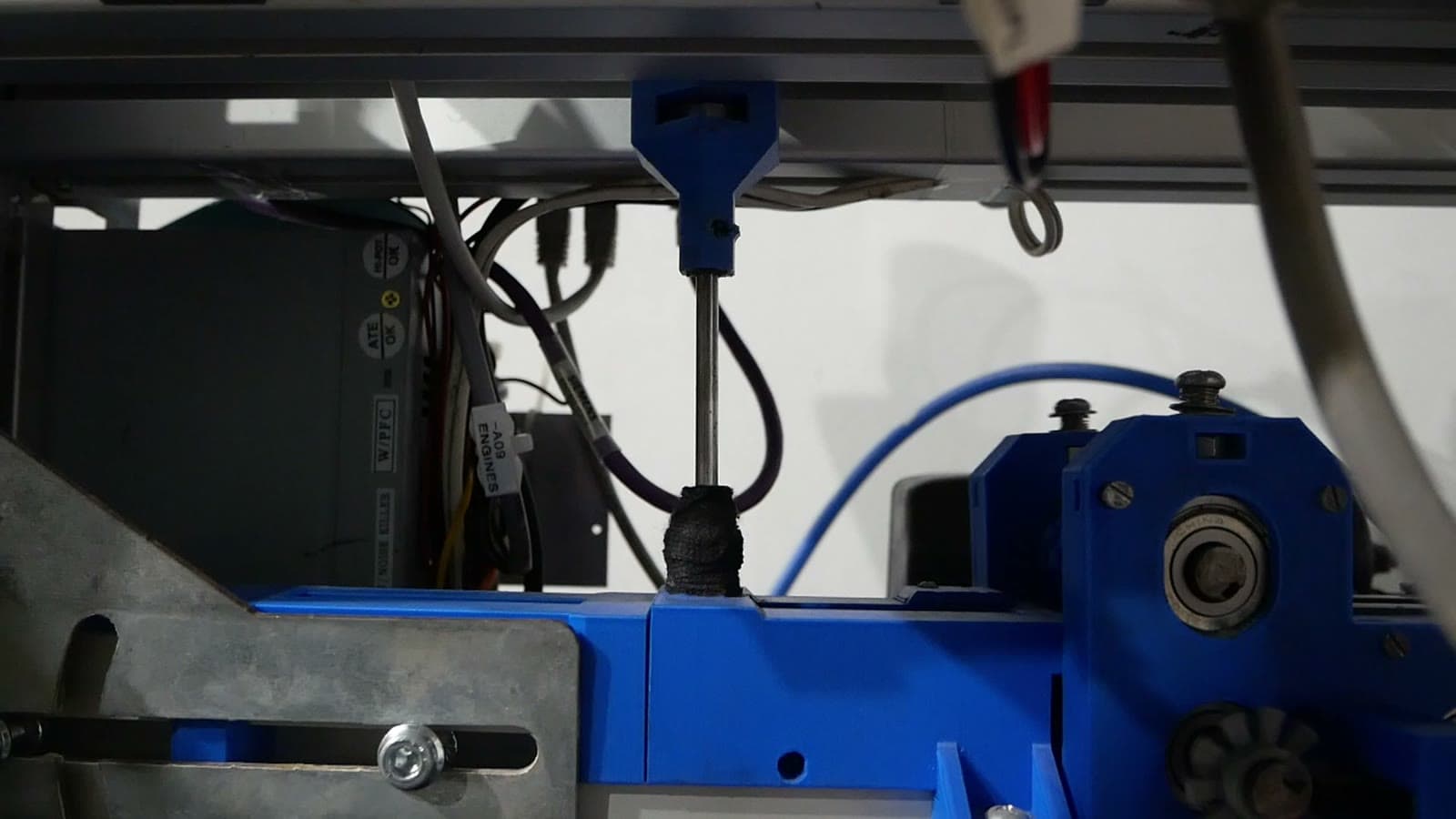 Close view of a sensor and belt mechanism